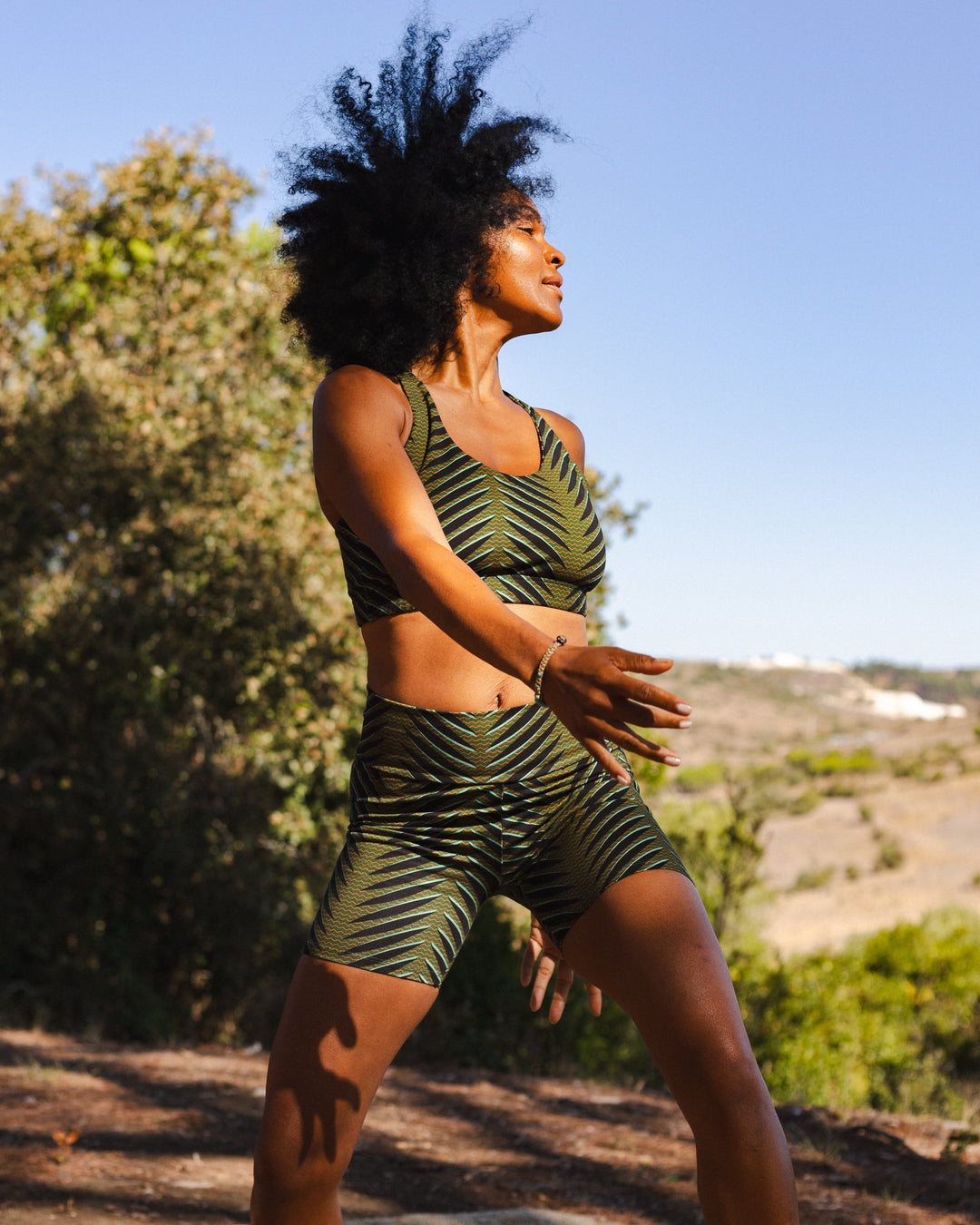 Woman wearing Zavala shorts and Zavala sports bra